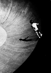 High angle view of man with umbrella on floor