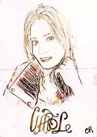 Close-up portrait of woman against white background