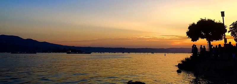 Scenic view of sea at sunset