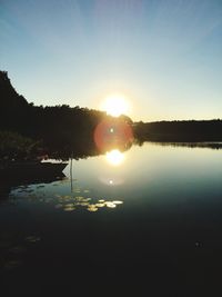 Scenic view of calm sea at sunset