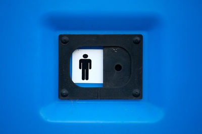 Close-up of public toilet for men only