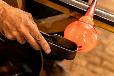 Close-up of man working in water