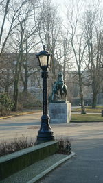 Statue of bare trees in park