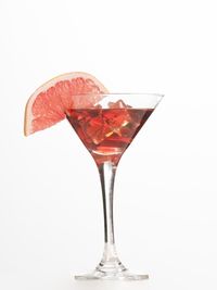 Close-up of beer glass against white background