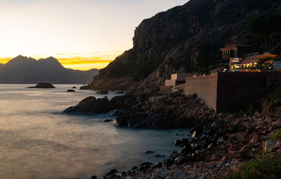 Scenic view of sea against sky during sunset