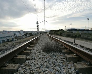 Railroad tracks against sky