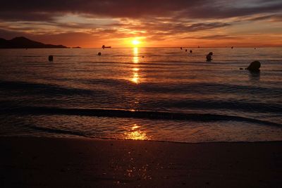 Scenic view of sea against sky during sunset