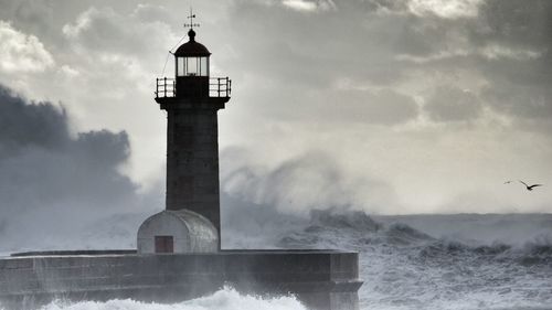 Low angle view of lighthouse against clear sky