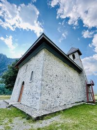 Low angle view of old building against sky