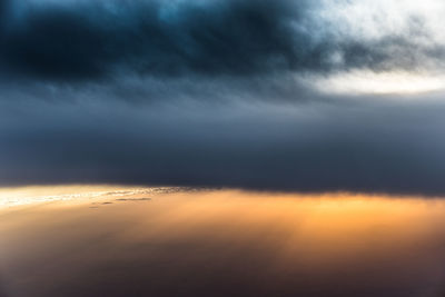 Scenic view of dramatic sky during sunset