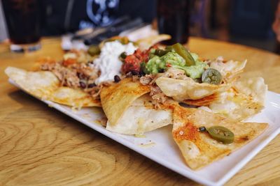 Close-up of food served on table