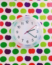 Close-up of multi colored clock