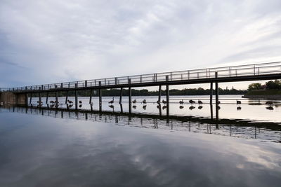 Bridge over river against sky