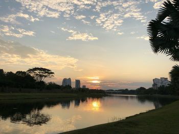 Scenic view of lake against sky during sunset