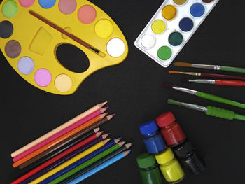 High angle view of colored pencils on table
