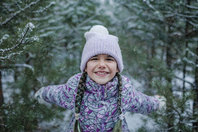 Portrait of smiling girl during winter