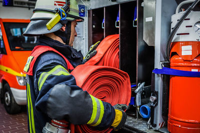 Firefighter removing rope