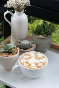 Close-up of coffee served on table