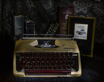 High angle view of telephone booth on table