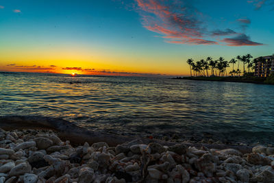 Scenic view of sea against sky during sunset