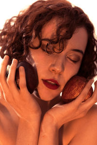 Close-up portrait of young woman