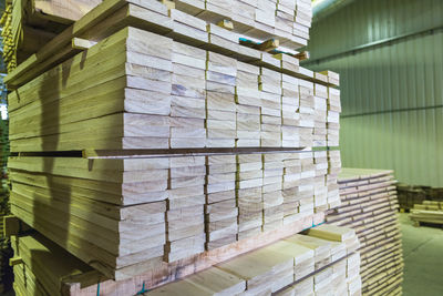 Wood flooring planks stored in wood processing factory