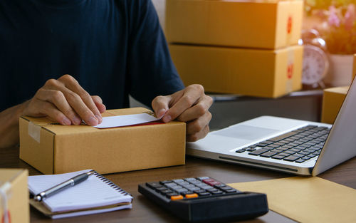 Man using laptop on table