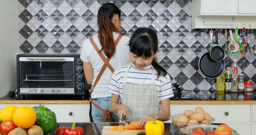 People standing on display at home