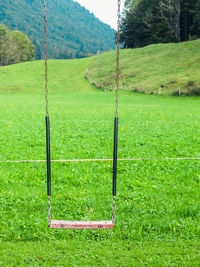 Green landscape against sky