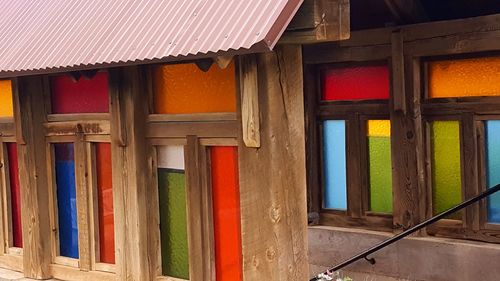 Multi colored windows of house