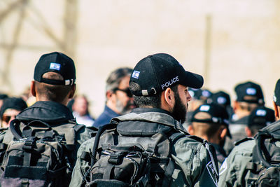 Rear view of people wearing hat