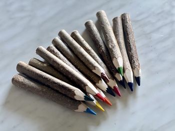 High angle view of colored pencils on table