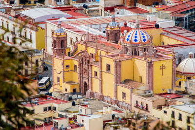 High angle view of street amidst buildings in city