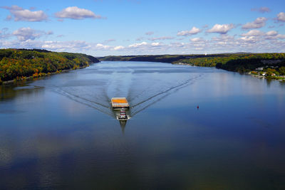 Tug boat pulling a barge on the hudson river