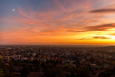 High angle view of townscape against sky during sunset