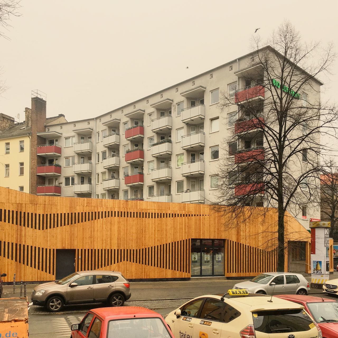 CARS ON STREET AGAINST CLEAR SKY