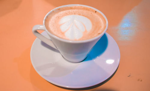 High angle view of cappuccino on table