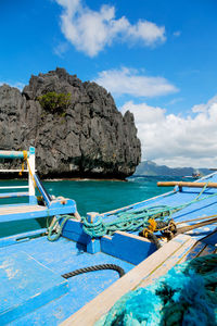 Scenic view of bay against blue sky