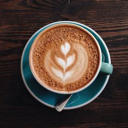 Directly above shot of cappuccino on table