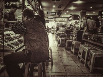 People standing in shopping mall