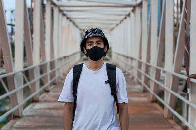Portrait of boy standing outdoors