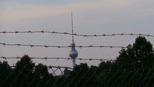 Low angle view of barbed wire