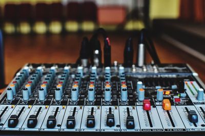 Close-up of sound mixer at studio