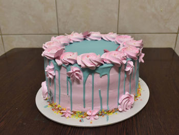 Close-up of pink cake on table