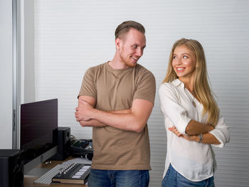 Portrait of a smiling young couple
