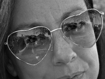 Close-up portrait of man wearing sunglasses