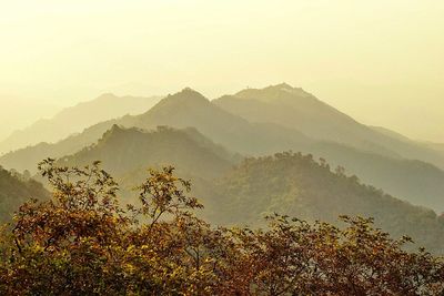 Scenic view of mountains against sky during winter