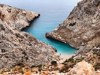 High angle view of rocks by sea