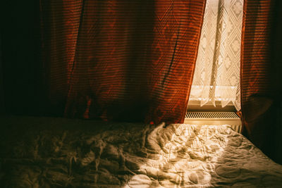 Sunlight streaming through curtains