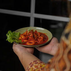 Close-up of hand holding food